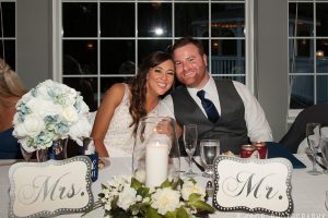 Sweetheart table with Mrs. and Mr. place cards and candlelight