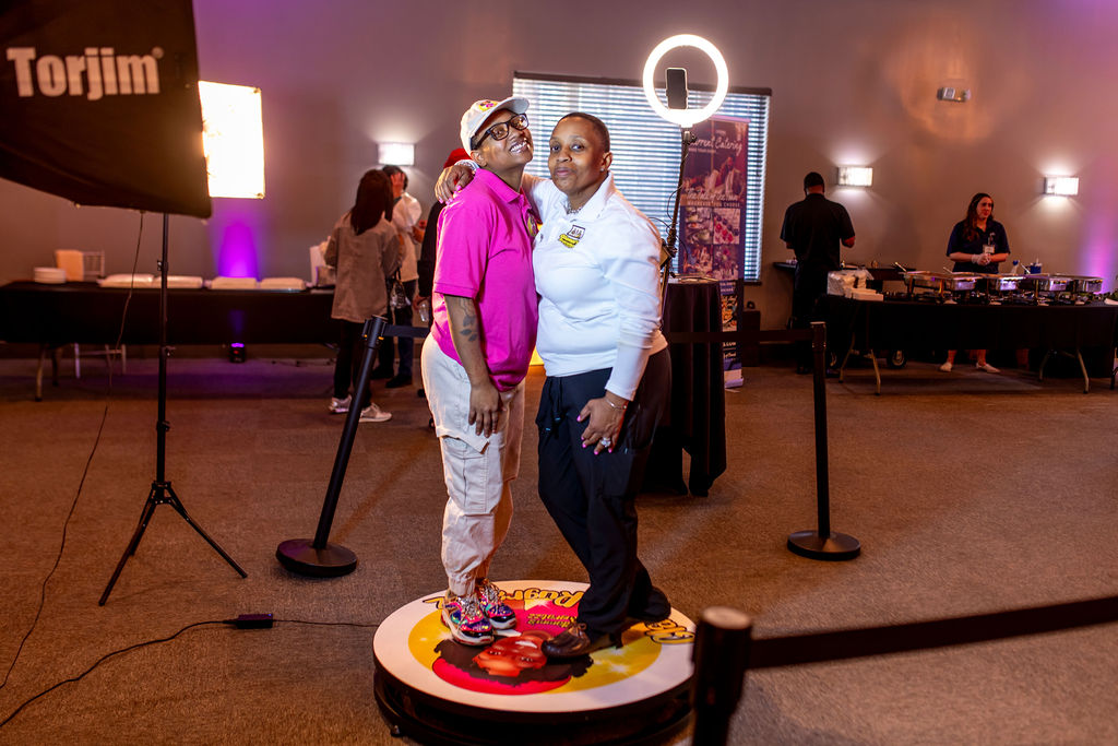 Guests enjoying a 360 photo booth