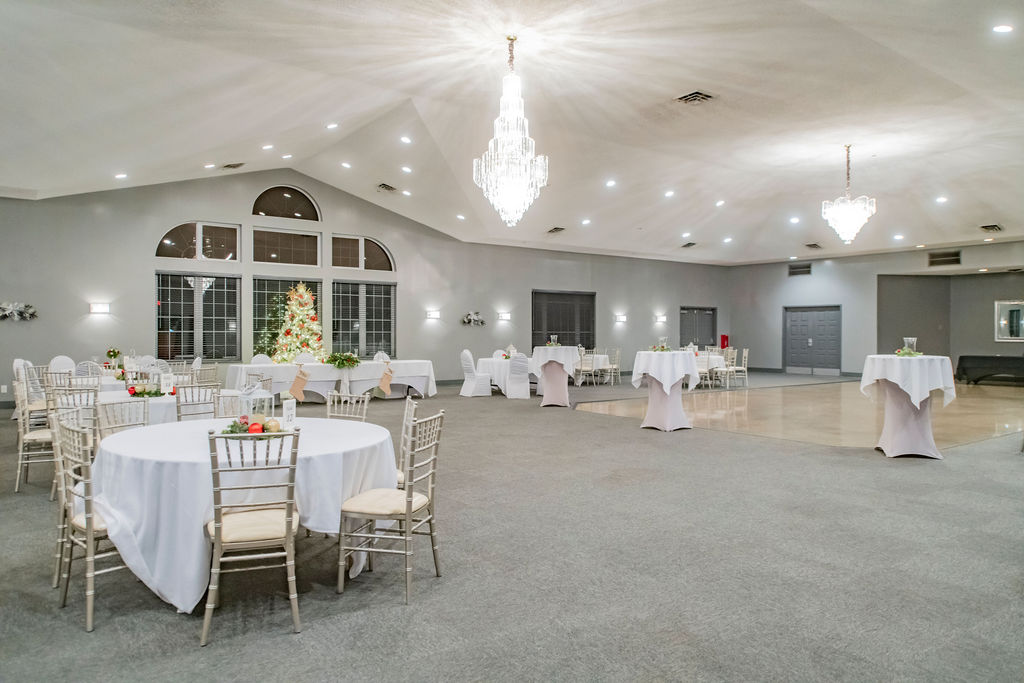 Wide view of the ballroom set for a reception