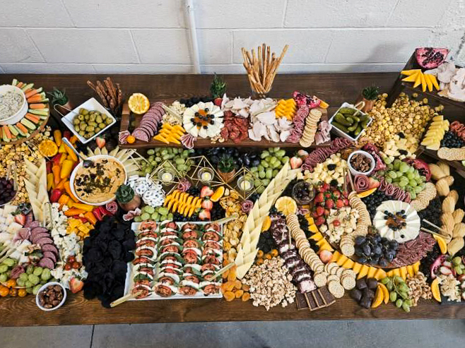 A charcuterie display prepared by Bailey Family Catering for a wedding reception
